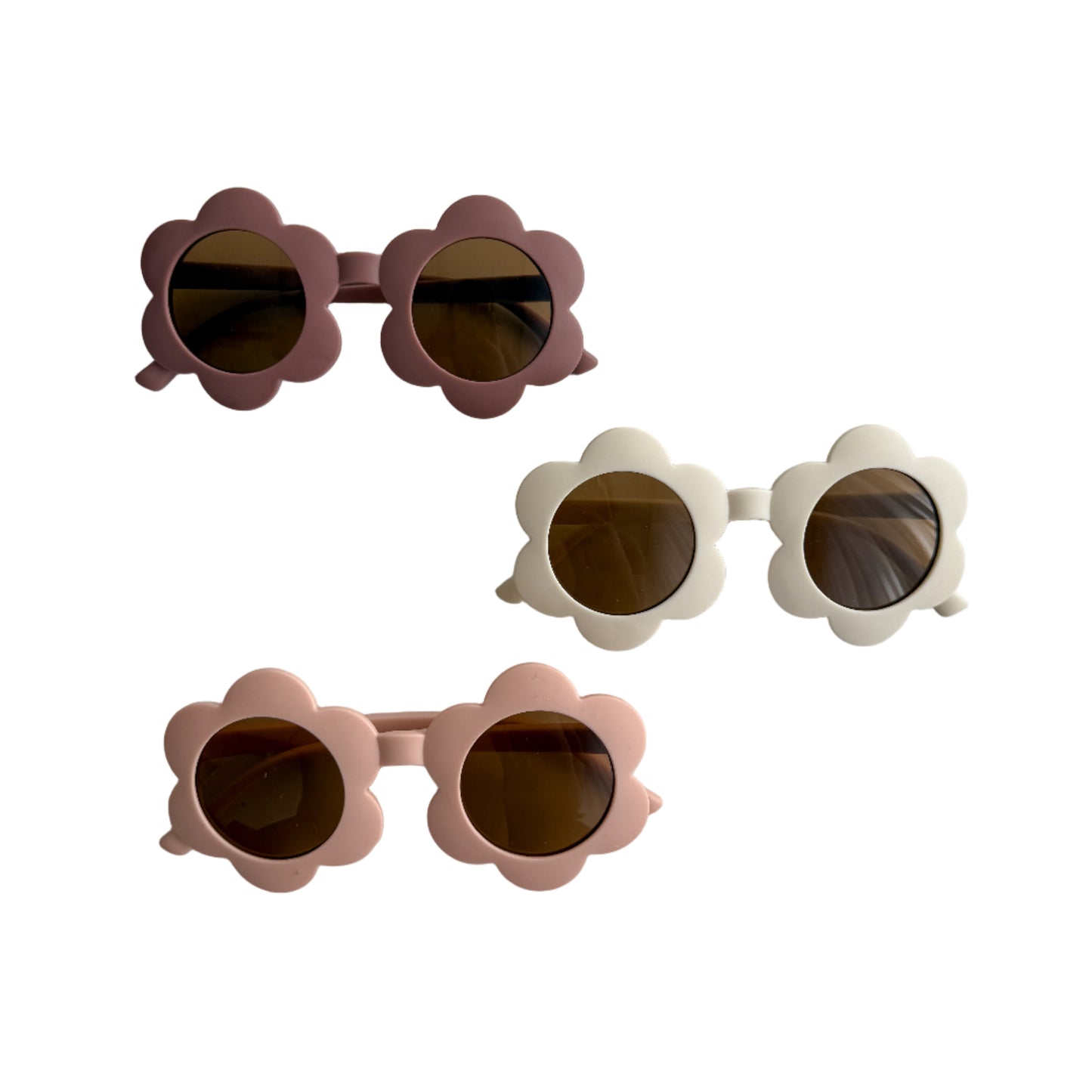 A collection of children's sunglasses with a flower-shaped frame, available in purple, beige, and pink colors.